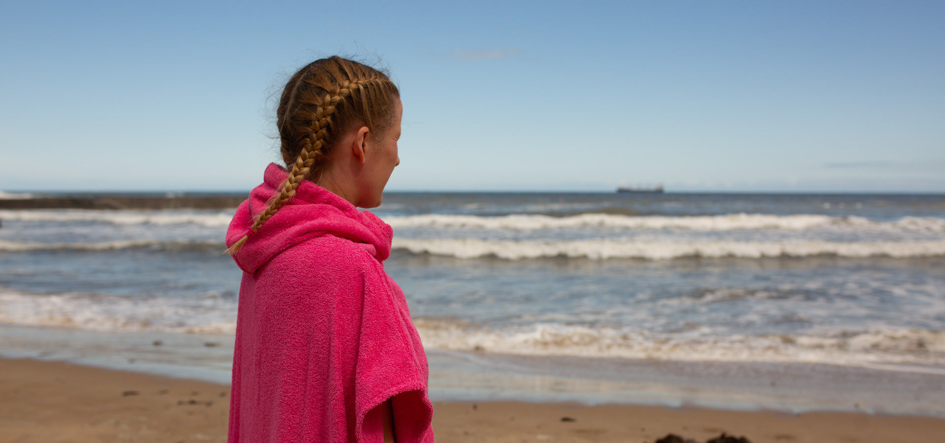 Swimmer looks out to sea