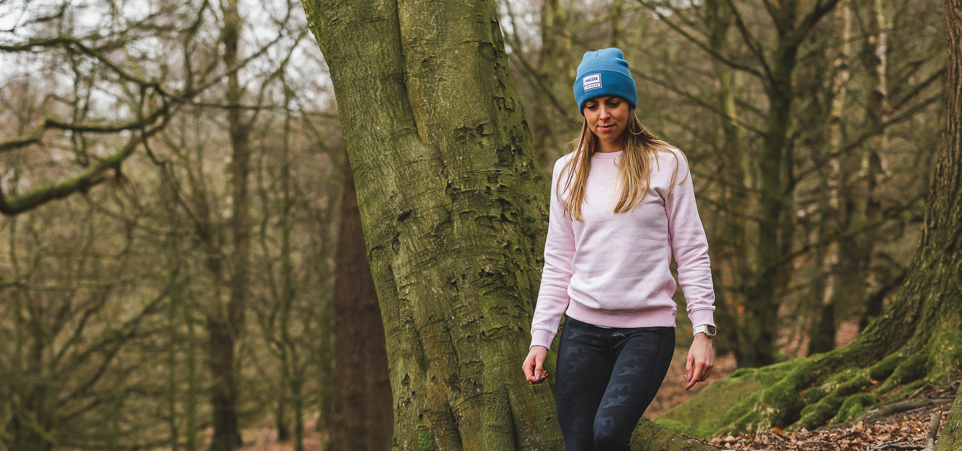 Female walks through the woods